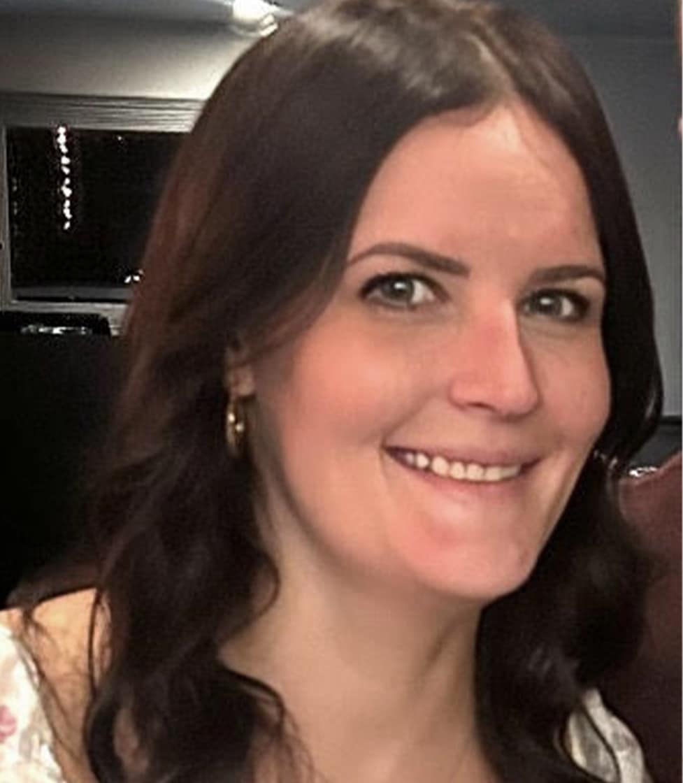 a woman smiling for the camera