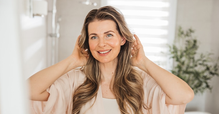 a woman smiling for the camera