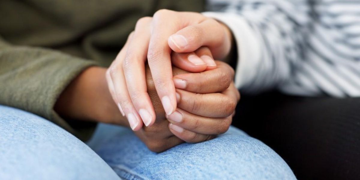 Healthcare provider consulting with a woman about hormone replacement therapy and its potential effects on libido | Does Hormone Replacement Therapy Help Improve Your Libido